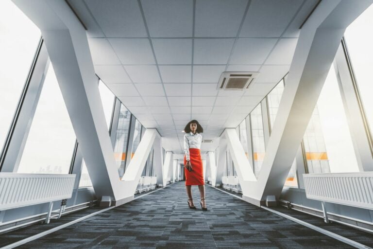 A woman entrepreneur in a passageway