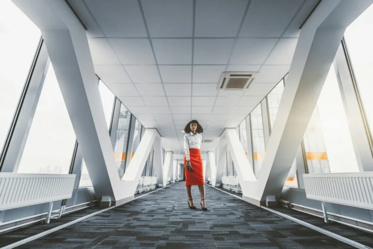 A woman entrepreneur in a passageway